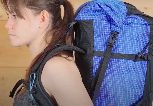 THIS PACK IS TOO TALL FOR LENA CAUSING IT TO LIFT OFF HER SHOULDERS