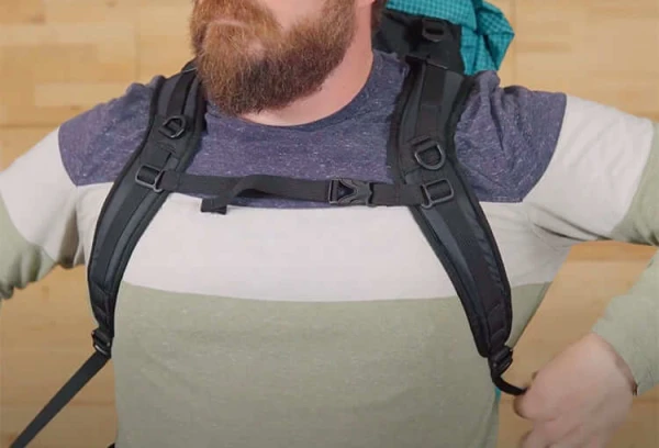 TJ USES AN S-STRAP (BROAD CHEST AND SHOULDERS)